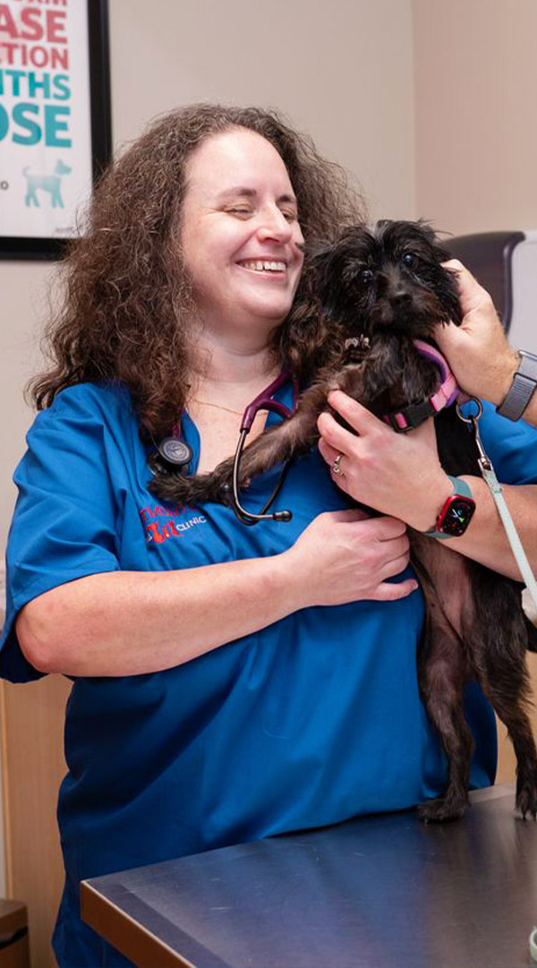 Dr Matagrano with a puppy
